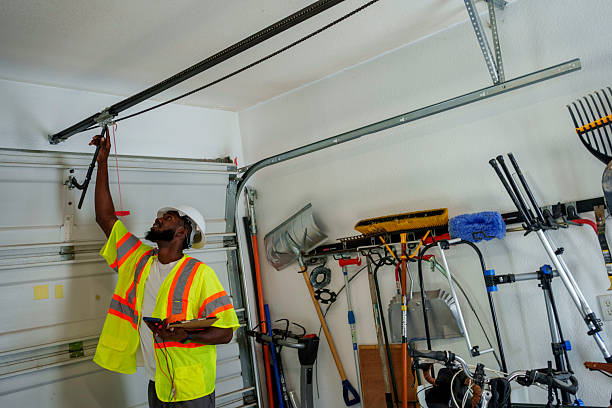 Professional Garage Door Roller Replacement technician working in Howard County County, MO